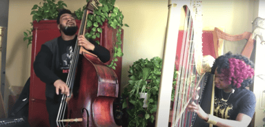 Photo of set Brandee Younger & Dezron Douglas.